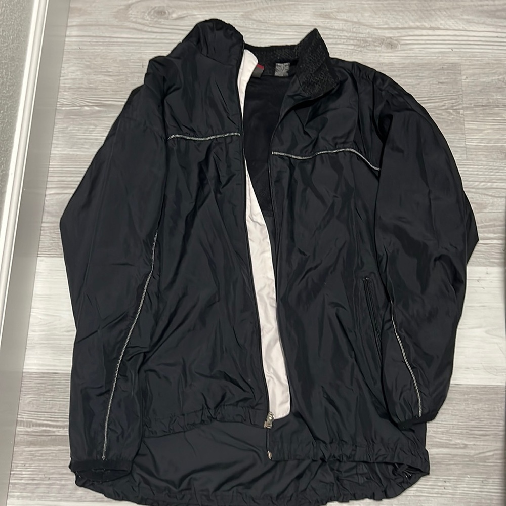 Black windbreaker. Men’s size L. Worn a few times.